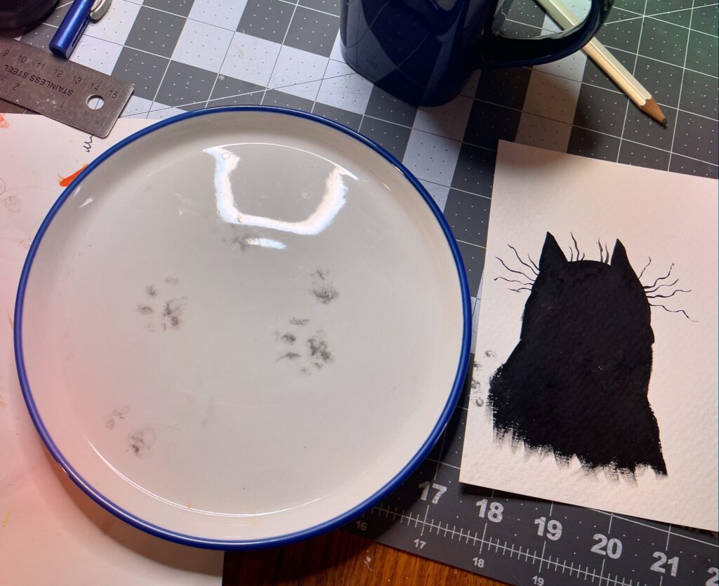 A painting of a cat with suspicious pawprints leading off of it